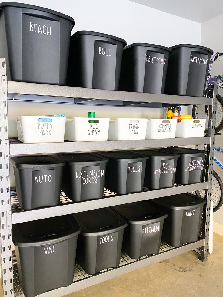 several bins are stacked up on the shelves