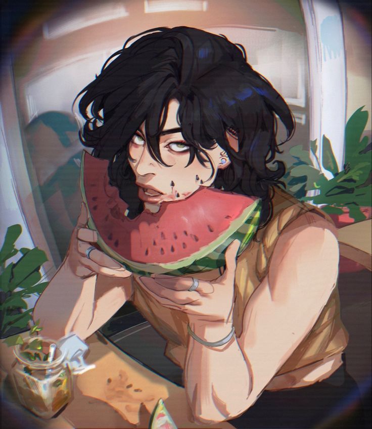 a person sitting at a table with a slice of watermelon