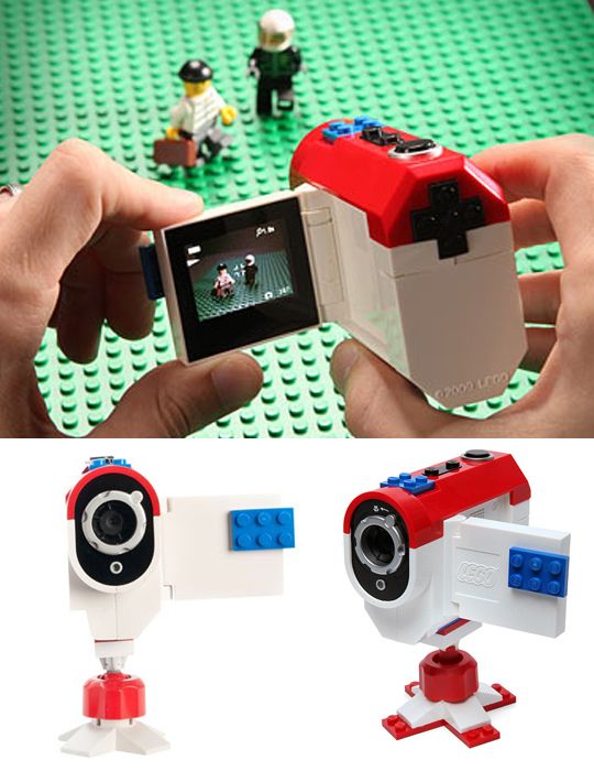 two legos are holding up a camera to take pictures with their cell phones and toys