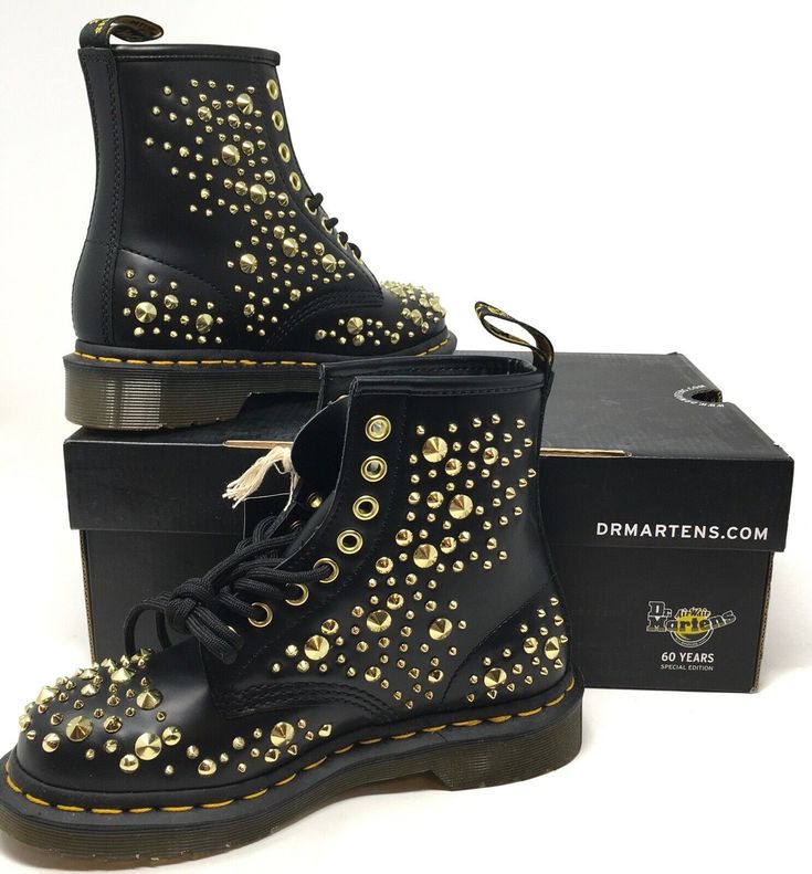 NIB Dr. Martens Made in England 1460 Midas Gold Studded Boots LIMITED EDITION** A special one-off 1460 boot - limited up to 1460 pairs. Stamped with gold studs of all shapes and sizes, the boots are kitted out with all the 1460's iconic details. Smooth leather, a welted DMS sole reinforced with our signature yellow stitch, and an AirWair heel loop.  Retail Price: $260 Details Color: Black Smooth Leather w/Gold Studs Size: Women's US 5 Only 1460 pairs made!!!! Polished Smooth is the original Dr. Black Stud, Studded Boots, Must Have Items, Goodyear Welt, Gold Studs, Smooth Leather, Combat Boots, Black Boots, Athletic Shoes