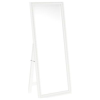 a white mirror sitting on top of a table