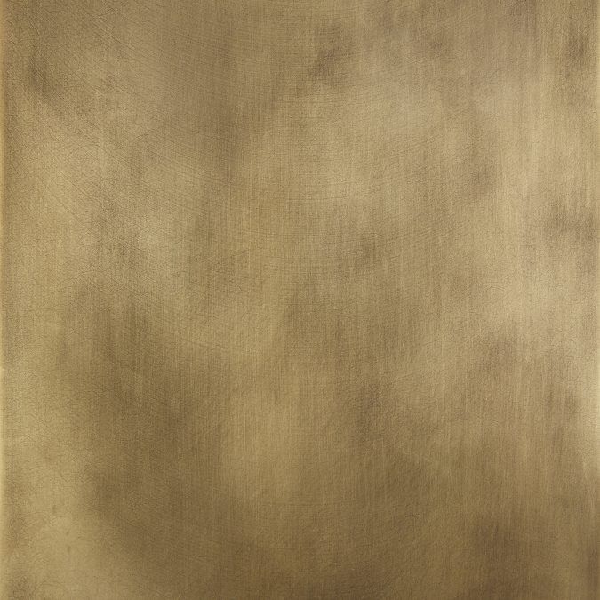 an abstract gold background with some white clouds