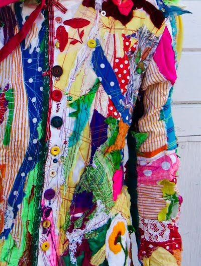 a person wearing a colorful shirt with buttons on it