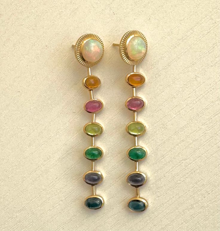 These M. Spalten 14K YG Sunbeam Rainbow Earrings, feature Opal Tops, Citrine, Pink Tourmaline, Peridot, Emerald, Iolite, Blue Topaz Disposable Income, Stacked Earrings, Ear Stack, Rainbow Earrings, Jewelry Lookbook, Ear Rings, Colorful Earrings, 2024 Fashion, Emerald Cut Diamonds