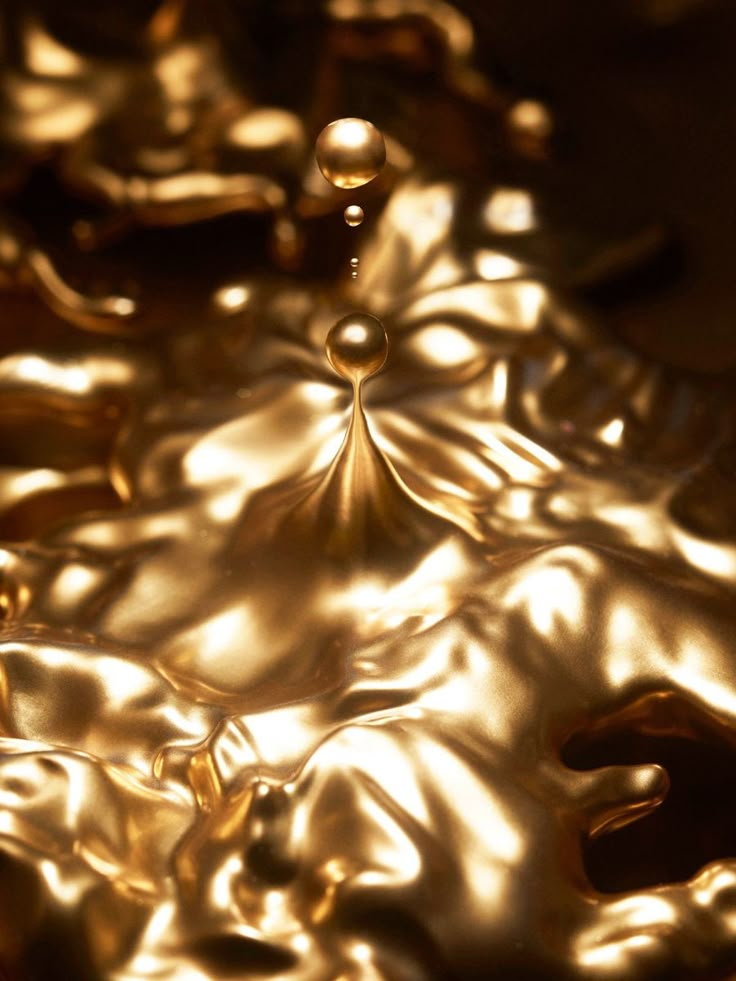 a close up view of some gold colored objects