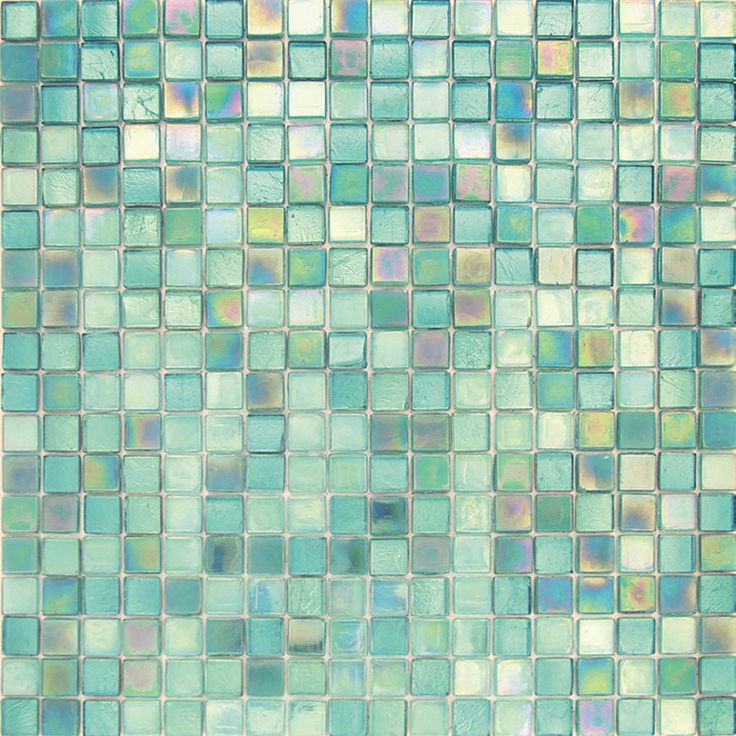 a green and blue mosaic tile wall