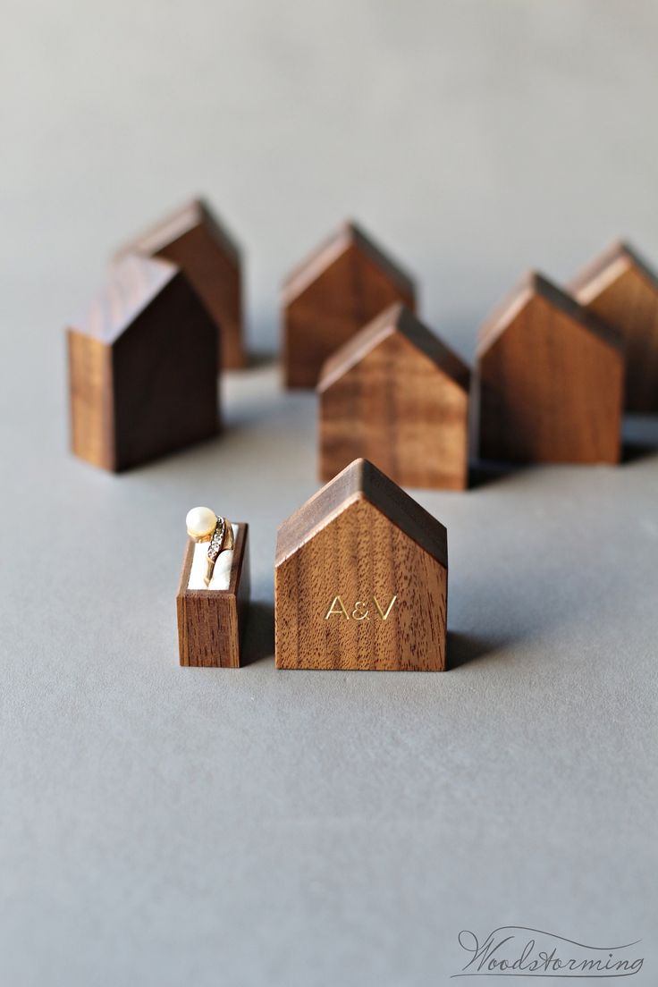 small wooden houses with the word love written on them