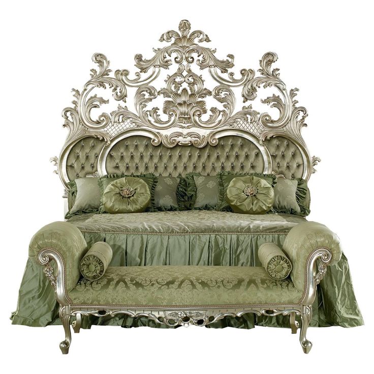 an ornate bed with green and gold pillows on it's headboard, sitting in front of a white background