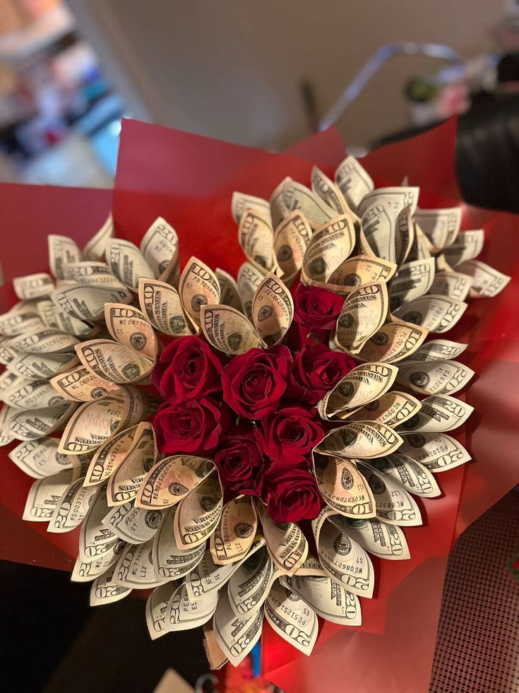 a bouquet of roses made out of money