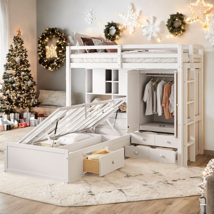 a white bunk bed with an open drawer underneath it and christmas decorations on the wall