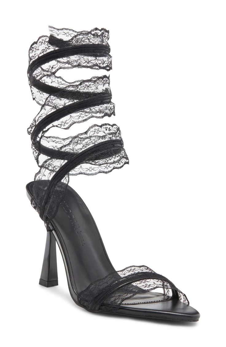 Lace-embellished straps sweeten a coiled wrap sandal lifted by a flared stiletto heel for chic style. 3 3/4" heel Textile and synthetic upper/synthetic lining/rubber sole Imported Fitted Black Lace-up Sandals With Wrapped Heel, Black Fitted High Heel Lace-up Sandals, Synthetic High Heel Lace-up Sandals With Wrapped Heel, Black Synthetic Lace-up Sandals With Wrapped Heel, Black Lace-up Synthetic Heels, Black Lace Heels, Hi Low Skirts, Classic Slippers, Wrap Sandals