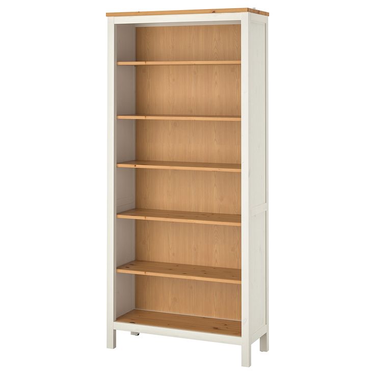 a white bookcase with wooden shelves on each side