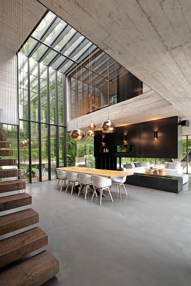 an open floor plan with stairs leading up to the upper level and dining room below