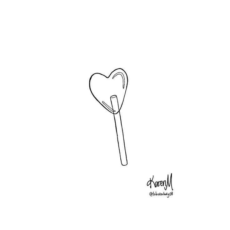 a black and white drawing of a heart shaped lollipop