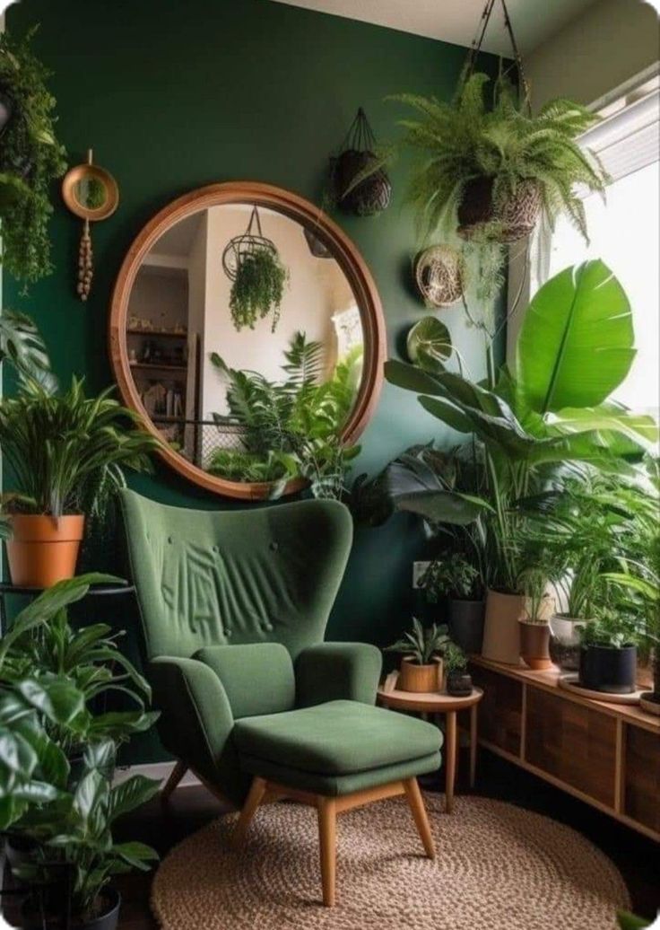 a living room filled with lots of green plants