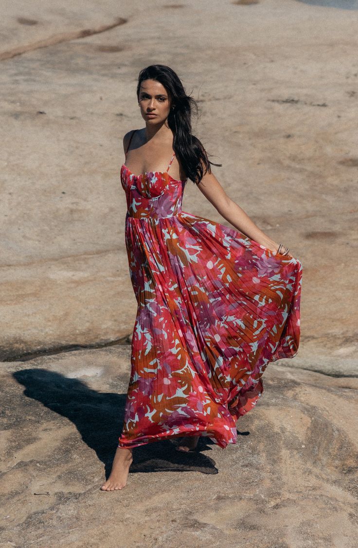 Flowy and romantic, this maxi dress showcases a structured bodice, a smocked back and neat pleats that add movement to the vibrant print. Hidden back-zip closure Sweetheart neck Spaghetti straps Partially lined 100% polyester Hand wash, dry flat Imported Flowy A-line Dress With Smocked Back, Chic A-line Maxi Dress With Smocked Bodice, Bohemian Ruched Maxi Dress For Garden Party, Pleated A-line Maxi Dress With Fitted Bodice, Floor-length Dress With Smocked Back For Spring, Spring Floor-length Dress With Smocked Back, Spring A-line Maxi Dress With Smocked Back, Flowy Maxi Dress With Smocked Bodice, Bohemian Maxi Dress With Smocked Bodice For Casual Wear