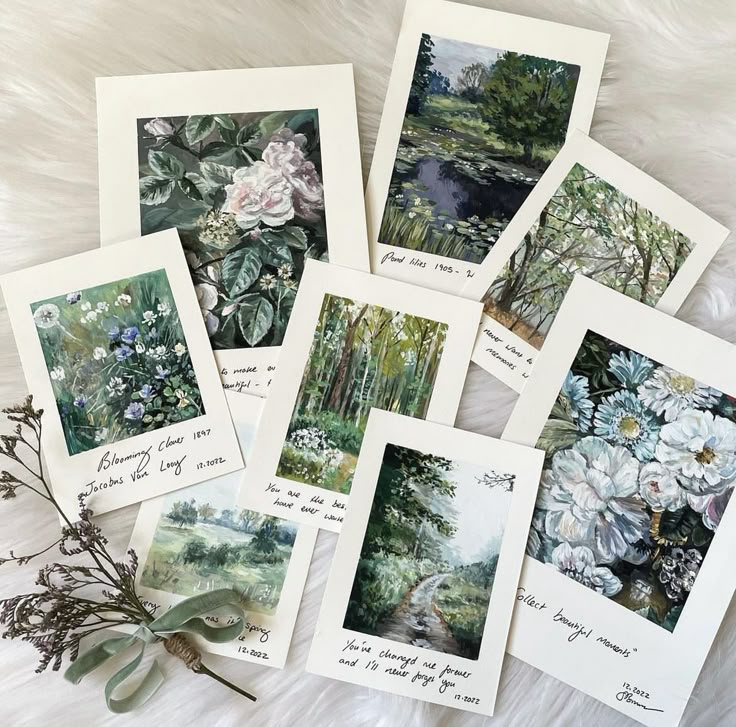 five cards with pictures of flowers and trees in them on a white furnishing