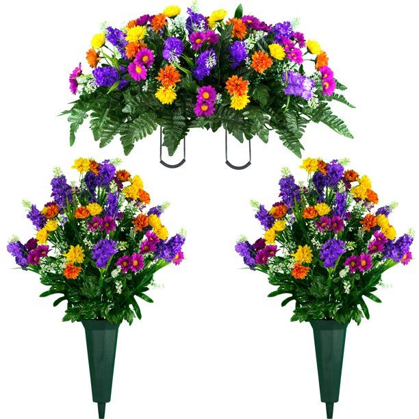 three flower vases with different colored flowers in them and hanging from the top, on a white background