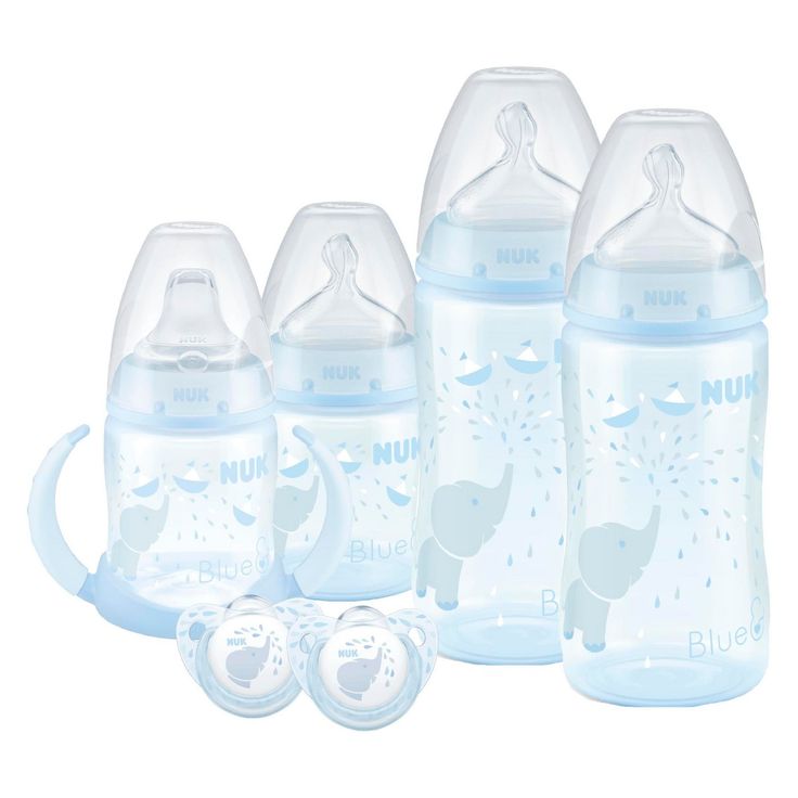 the nuk baby bottles are blue with elephants on them