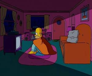 the simpsons is sitting in his living room