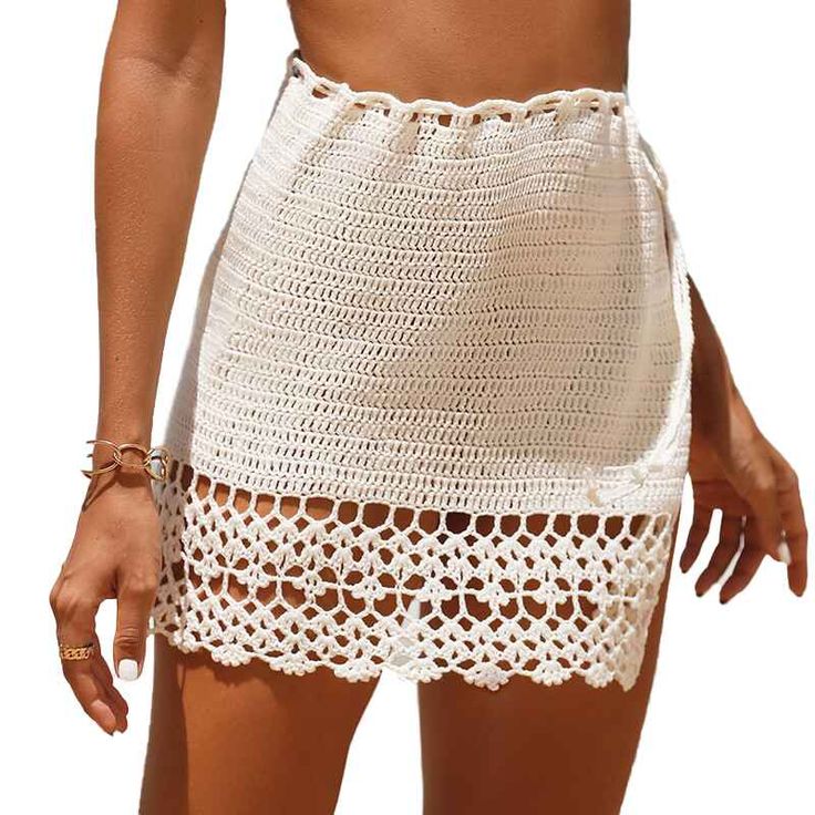 Women's Elastic Waist Tassel Crochet Hollow Out Sheer Beach Swimwear Cover Up Mini Skirt Mini Skirt K560 Acrylic Imported Hand Wash Only The fabric has some stretch Feature: long sleeve, hollow out, crochet cover up, cover ups for swimwear women Regular fit, swim cover-ups for women, crochet cover-ups for swimwear wome