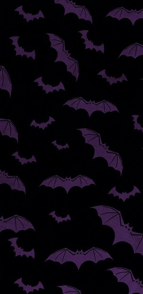 purple bats flying in the night sky