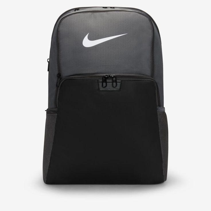 The Nike Brasilia Backpack gives you plenty of organized space to keep your gear in check and ready for your next adventure, even if that's just getting to and from school or the gym. The durable design is made to hold up for everyday use. This product is made with at least 50% recycled polyester fibers. Benefits Zippered main compartment offers secure storage. Densely woven polyester stands up to the bumps and scrapes of everyday transport. Ventilated zip pocket on the front stores used gear aw Nike Standard Backpack, Nike Functional Backpack For Outdoor Activities, Nike Backpack For Outdoor Activities, Nike Practical Backpack For Outdoor Activities, Practical Nike Backpack For Outdoor Activities, Functional Portable Laptop Backpack, Nike Nylon Standard Backpack, Nike Nylon Backpack For Outdoor Activities, Nike Practical Backpack For Everyday Use