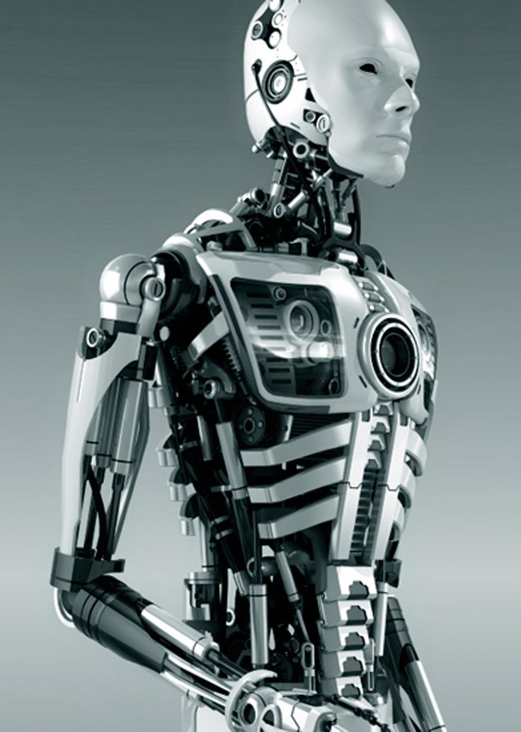 a robot standing in front of a gray background