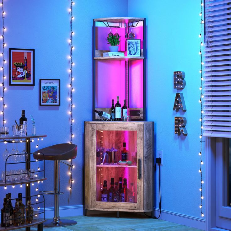 a room with blue walls and lights on the wall is lit up by colorful lights