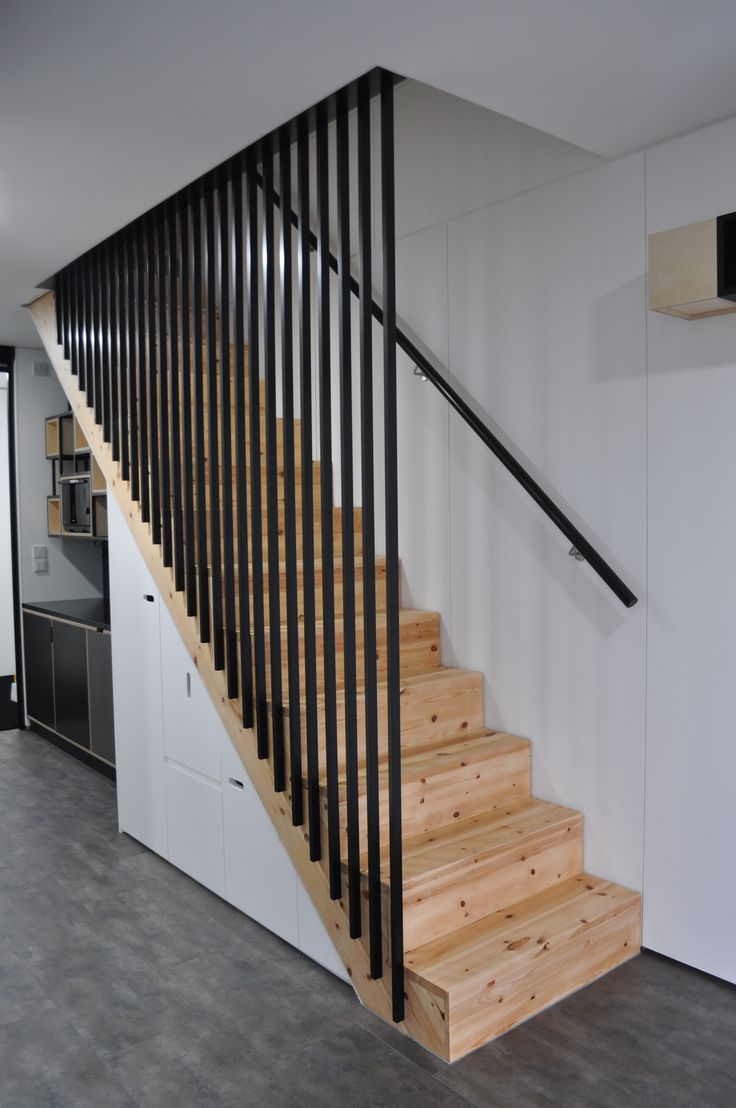 the stairs are made of wood and metal