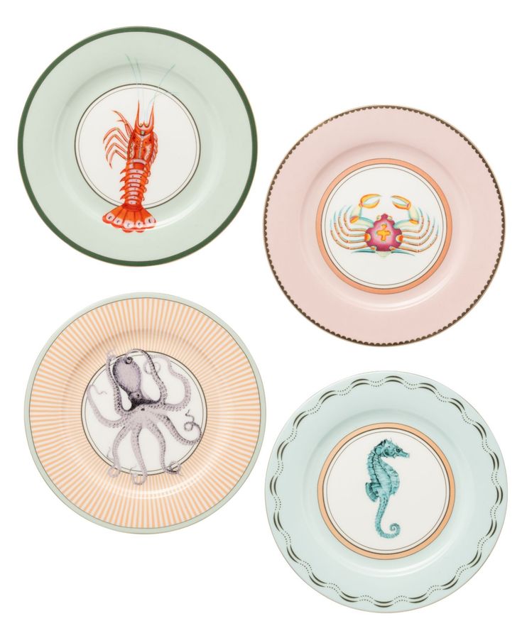 four plates with different designs on them, one has an octopus and the other has a sea horse