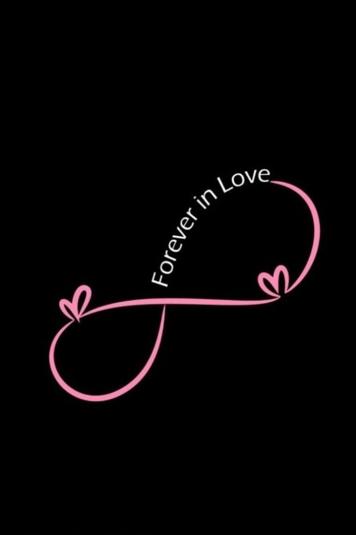 a pink ribbon with the words forever in love