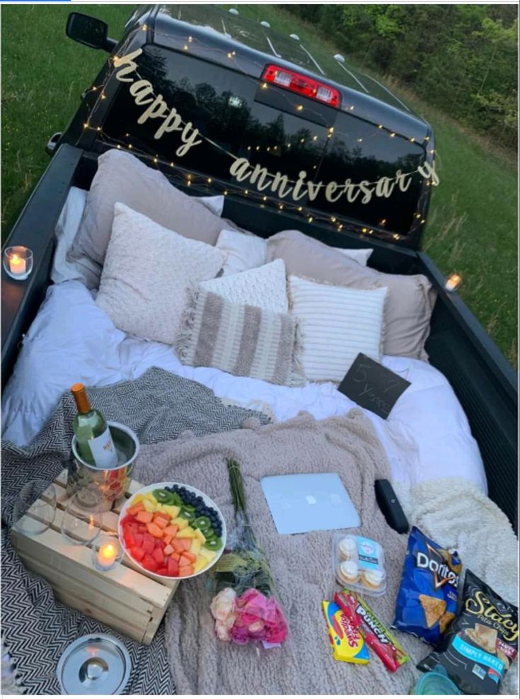 an open truck bed filled with food and drinks