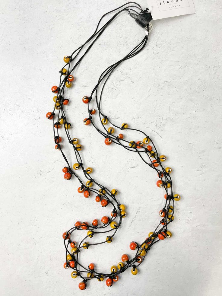 Jianhui London 4 Strand Ceramic Beads Knotted Cord Necklace, Orange/Mustard - Statement Boutique Necklace Orange, Italian Leather Bags, Denim Day, Textile Jewelry, Beautiful Drapes, Cord Necklace, Ceramic Beads, Cotton Cord, Strand Necklace