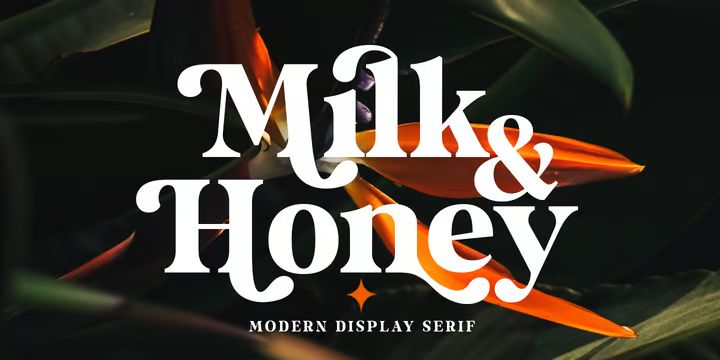 the words milk and honey written in white on a dark background with tropical leaves around it