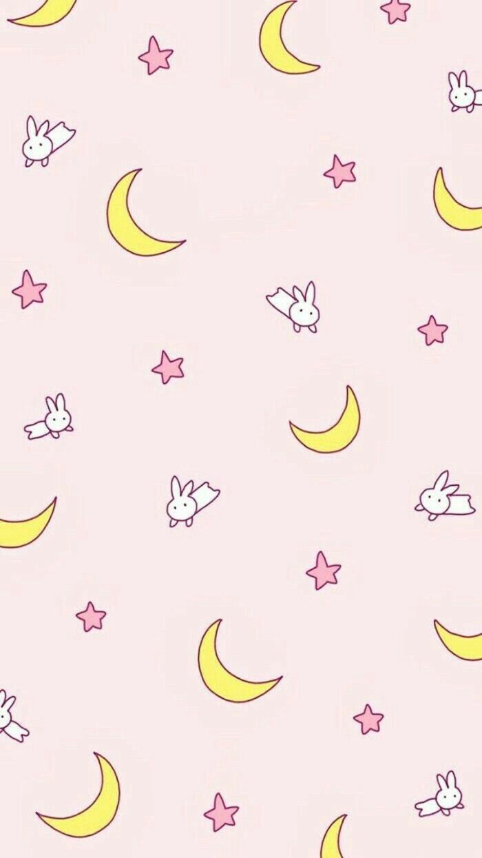 a pink background with stars, moon and rabbits