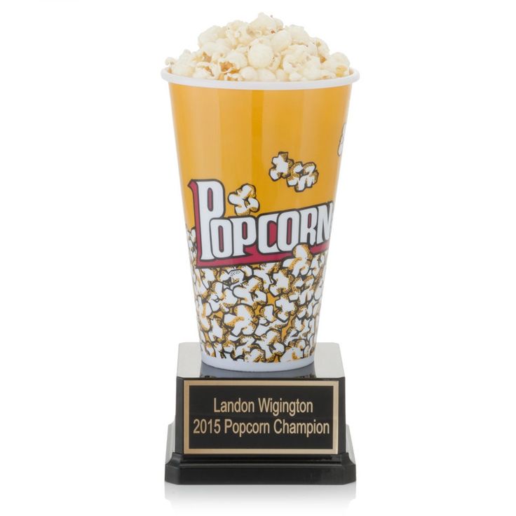 a popcorn cup on top of a trophy