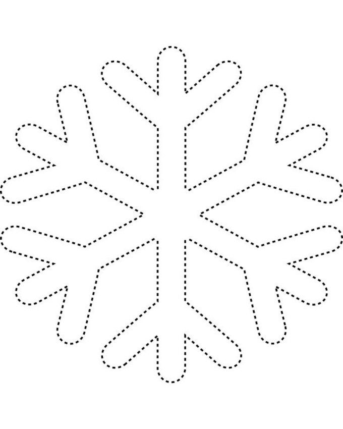 a snowflake cut out from paper with dotted lines in the shape of a snowflake