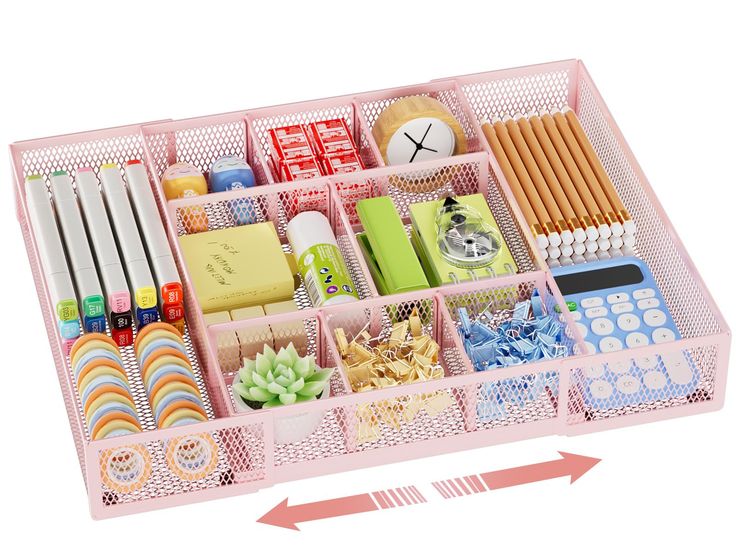 a pink plastic drawer filled with lots of different items and pencils on top of it