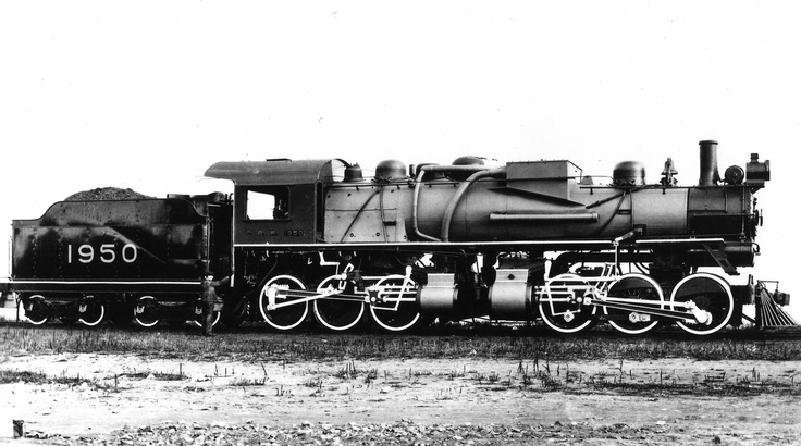 an old black and white photo of a train