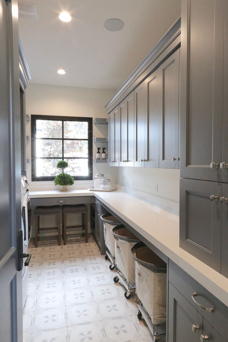 the kitchen is clean and ready to be used as a laundry room or office space