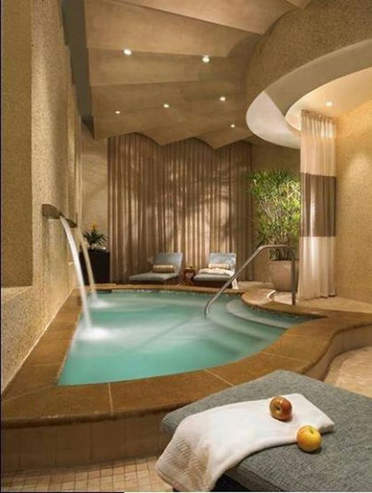 an indoor swimming pool in a hotel room