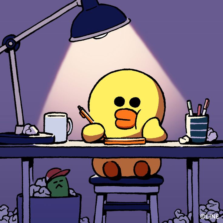 a cartoon character sitting at a desk with a light on