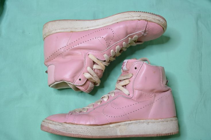 "Wow these are just so good! And they are bubble gum PINK leather. Original vintage 80's PINK NIKE Penetrators. Womens size 9, fits true to size. Stiffness to left toe, some glue yellowing around sole edges, scuffing to right shoe outside. In pretty good condition for age and use. Great pre Margiela like swoosh with just perforated holes, such a cool modern look for 1980. Made in Republic of Korea as stated on back of tongue. Bottom length measures 10 1/2\" Bottom across measures 3 1/2\" Length Eighties Shoes, Vintage Nike Sneakers, 80s Shoes, Instant Family, 80's Fashion, Nike Retro, Red And White Dress, Rainbow Shoes, Cute Shoes Heels