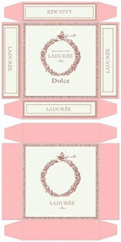 two pink and white boxes with labels on them