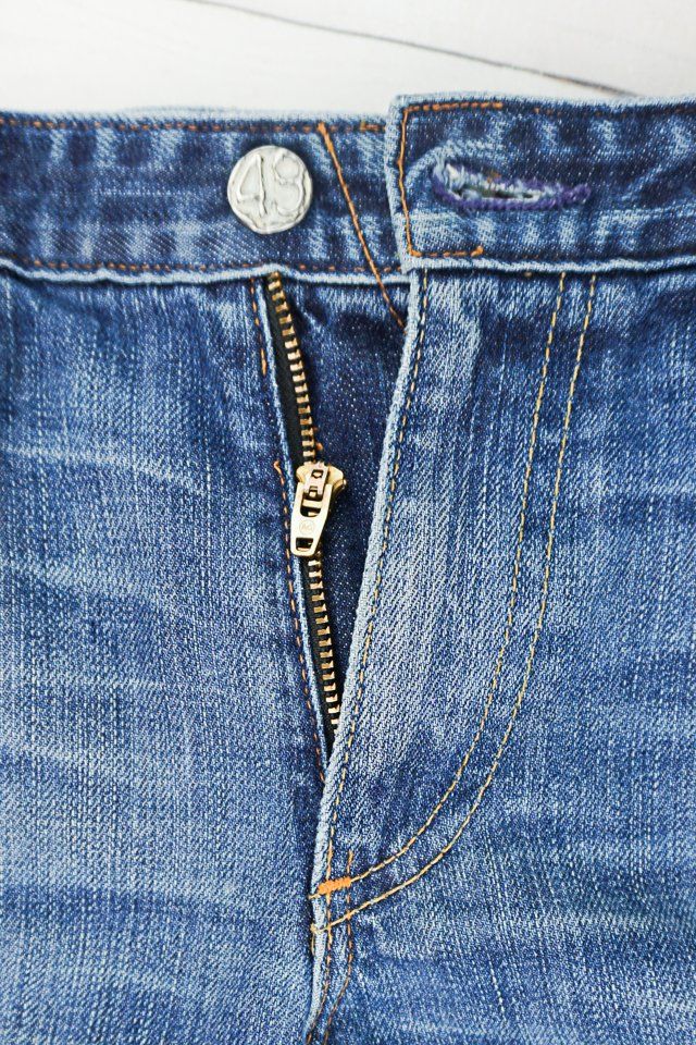 the zipper on jeans is open to show how to fix a zipper - on jeans