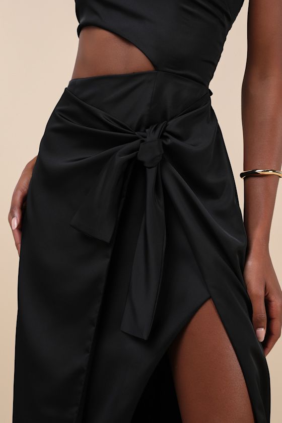 The Lulus Vacay Beauty Black One-Shoulder Tie-Strap Midi Dress is ready for seaside dinners and late night drinks! Sleek woven satin shapes a tying one-shoulder neckline and a darted bodice. A wrapping side cutout accents the fitted waist that tops an asymmetrical column skirt, with an overlapping panel that ties at the side to form a sarong-style effect. Chic midi hem completes the look! Hidden zipper/clasp at side. Fit: This garment fits true to size. Length: Mid-calf length. Size medium measu Late Night Drinks, Seaside Dinner, Sarong Style, Cutout Midi Dress, Column Skirt, Adhesive Bra, Blue Scarf, Vacation Dresses, Strapless Bra