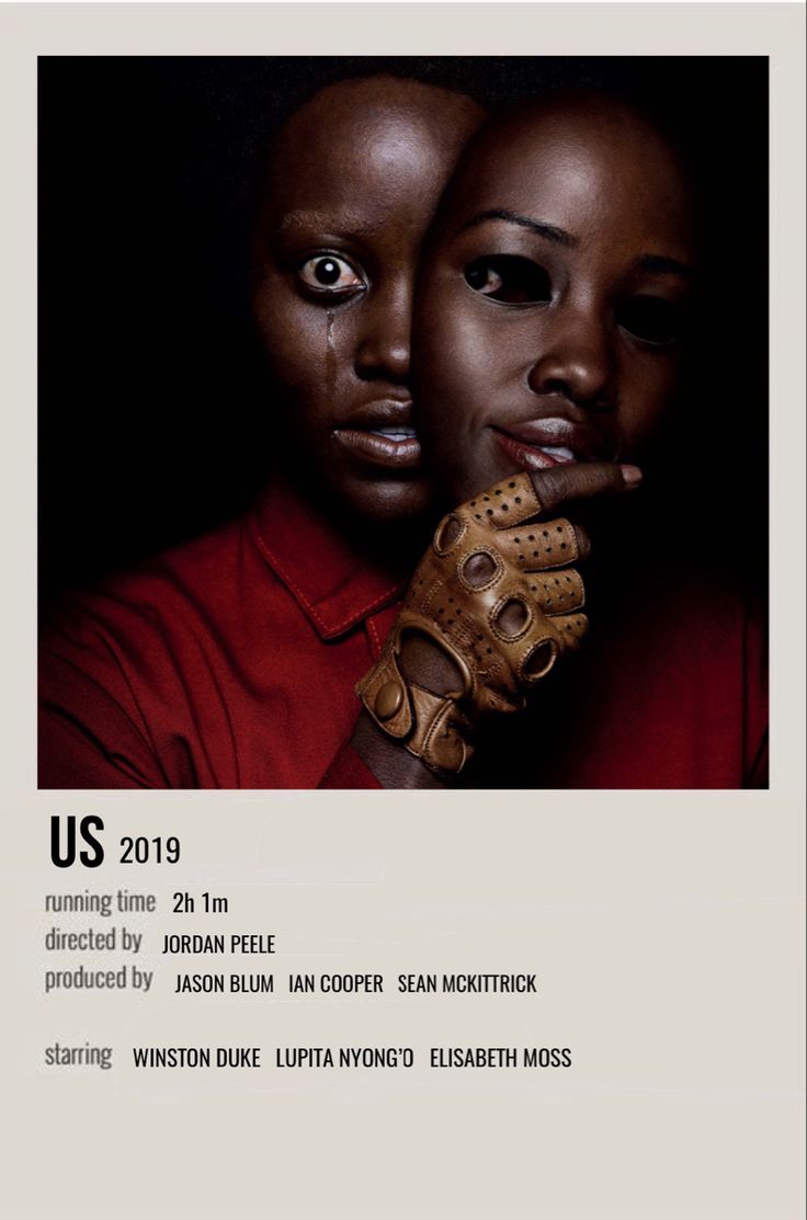 two people with gloves on their hands in front of a poster that says us 2013