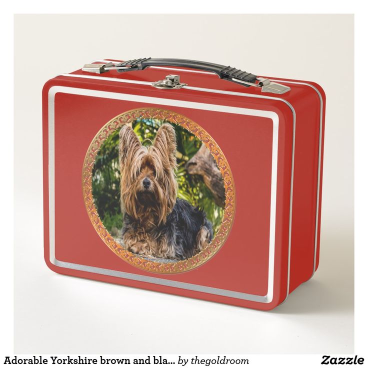 a small red suitcase with a photo of a dog on the front and back side