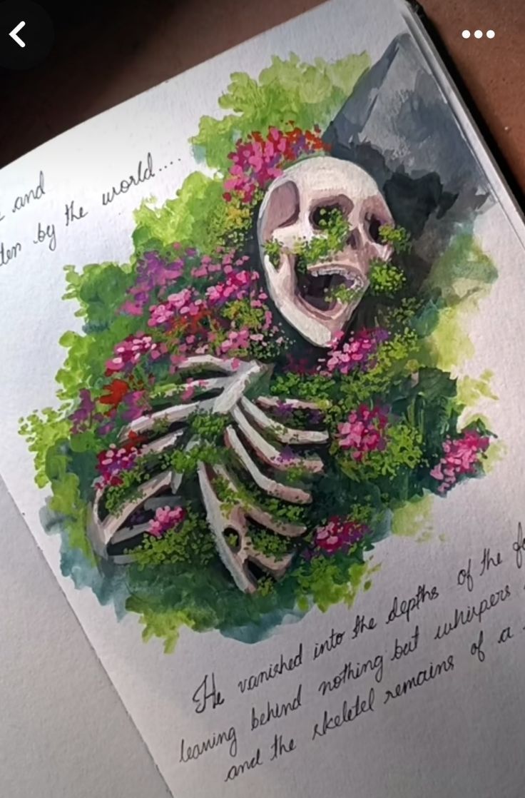 an open book with a drawing of a skeleton and flowers